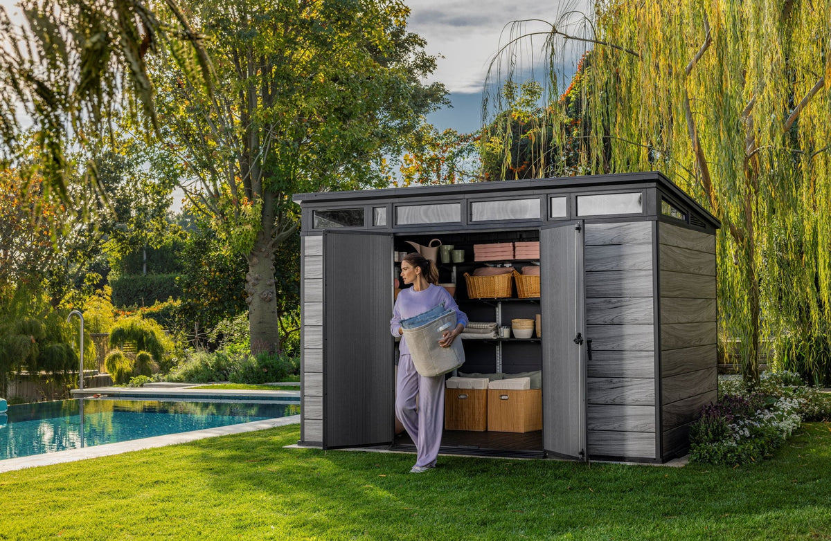 2026 NewKeter Signature 11x7 ft. Durable Resin Outdoor Storage Shed With Heavy Duty Floor and Locking Door, Walnut