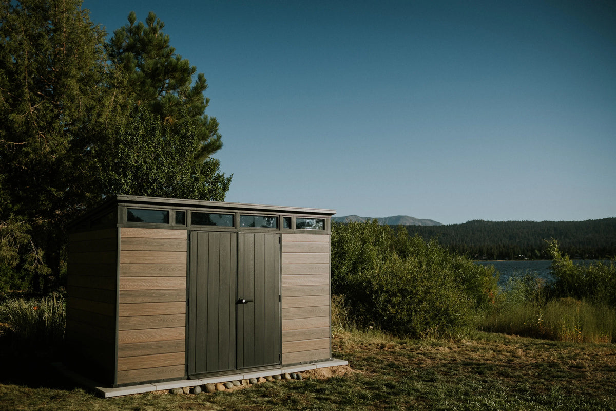 2026 NewKeter Signature 11x7 ft. Durable Resin Outdoor Storage Shed With Heavy Duty Floor and Locking Door, Walnut